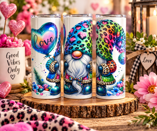Colorful Love Gnome tumbler displayed with pink hearts and flowers in a cozy Valentine's Day setting